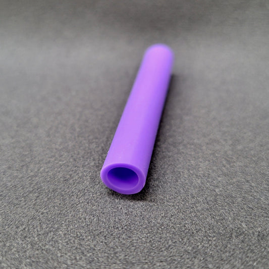 Purple silicone tubing on a gray background